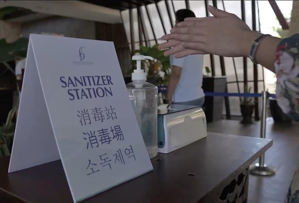 The Bellevue Resort Panglao Dış mekan fotoğraf A hand sanitizer station at a hotel in Seoul, South Korea