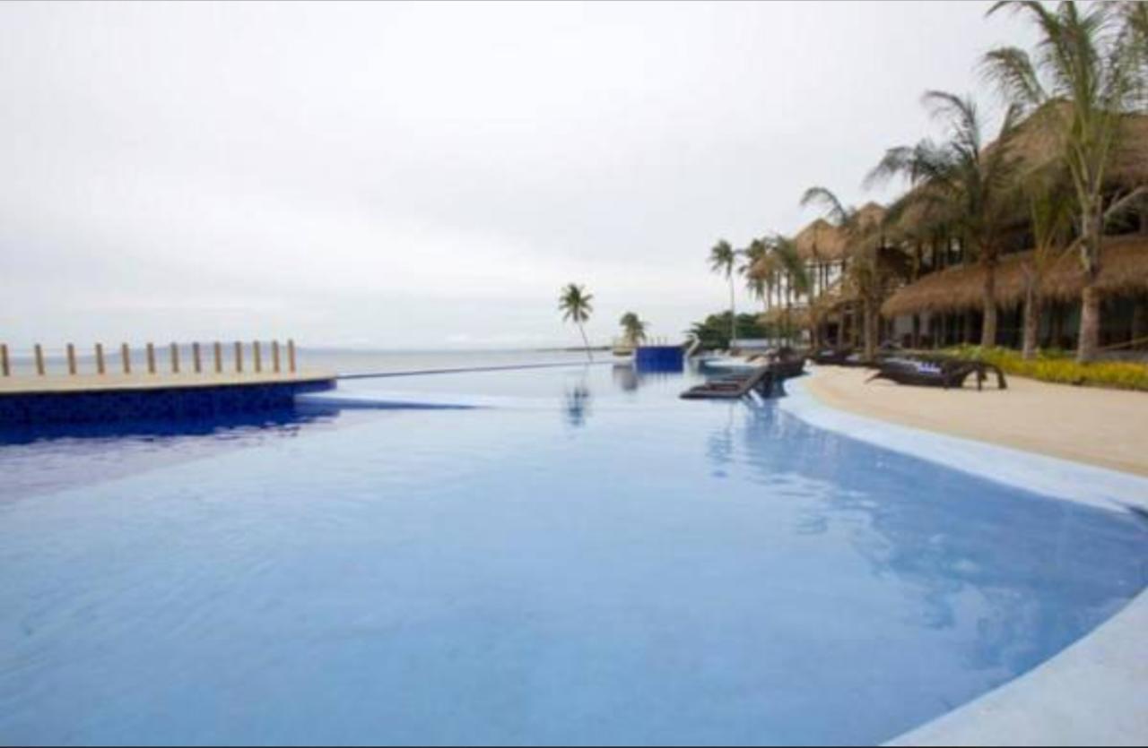 The Bellevue Resort Panglao Dış mekan fotoğraf Infinity pool at the Iberostar Grand Hotel, Playa del Carmen, Mexico